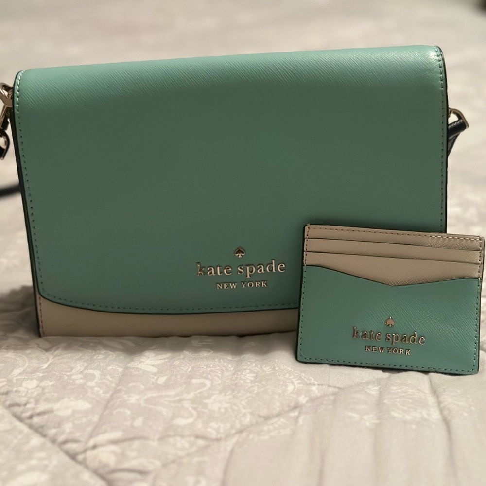 Kate Spade Carson cross body in pool blue, navy, white with matching card case